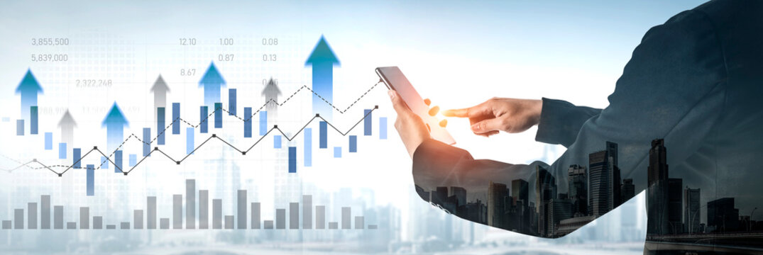 A business professional engages with a digital tablet, analyzing financial data represented by rising graphs, with a modern city skyline in the background. Scalp