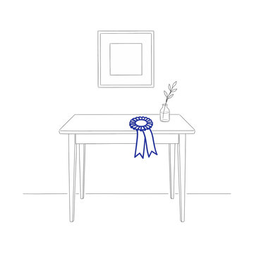 Minimalist table with a blue ribbon award and vase of flowers  