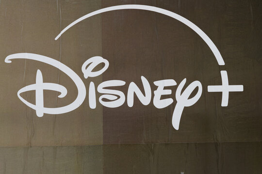 close-up of a Disney+ logo on wheatpaste posters in Toronto, Canada (2026)