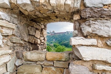 View from the embrasure. Curtain wall at Kamyanets-Podilsky fortress, Ukraine © Leonid Andronov