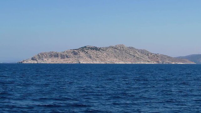Scenic view of Moni island in Greece from water