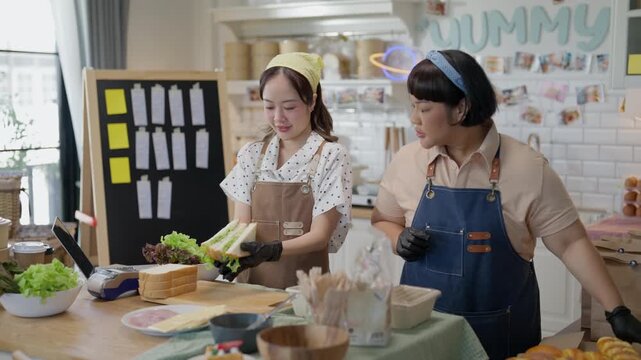 Cooking Baking Kitchen Live Streaming Online with Two Asian Women Preparing Fresh Sandwich and Salad, Sharing Practical Food Preparation Tips, Bright Home Kitchen Teamwork, Engaging Culinary Lesson