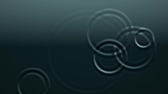 Raindrop ripples spreading slowly on calm deep teal water, zen meditation background with copy space, seamless loop, 4K