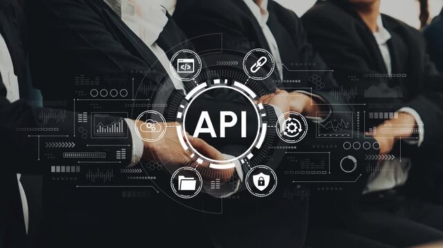 Business professionals in suits discussing API technology with digital interface and graphics for modern software solutions and integrations. Entropy.