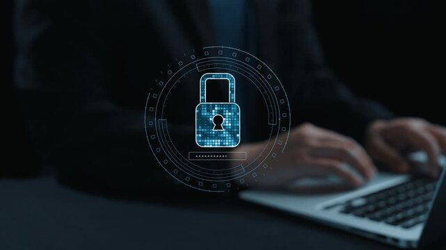 A business professional works on a laptop showcasing a digital cybersecurity theme with padlock graphics and data protection symbols, emphasizing online safety. Qubit