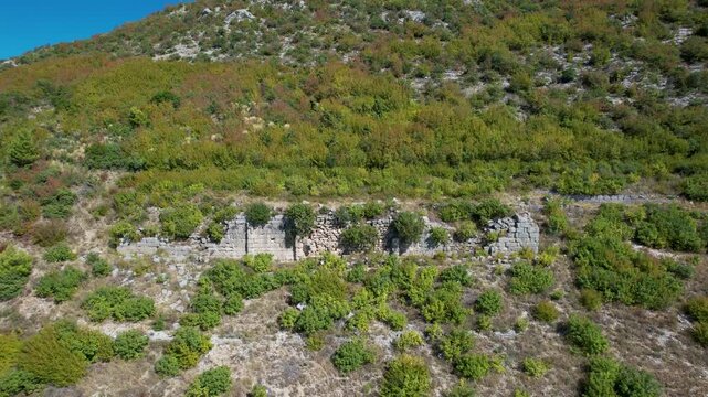 Cyclopean stone masonry and thick defensive walls at the ancient Illyrian Persqopi Castle