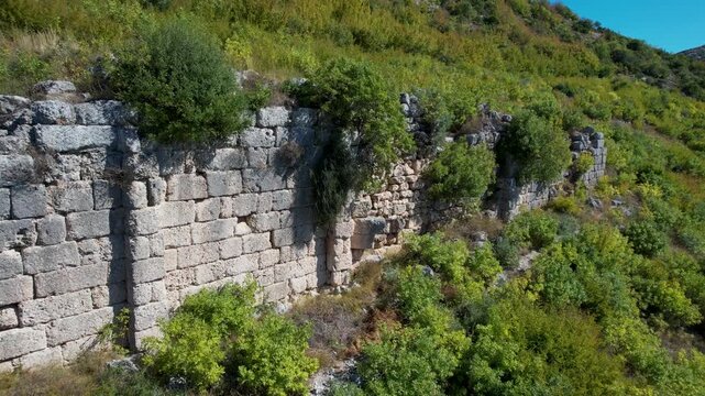 Persqopi Castle ruins highlighting thick ancient walls dating to the Illyrian Parthini era