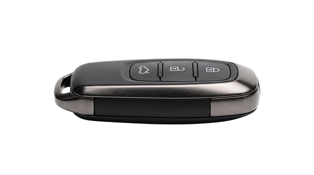 Modern black car key fob remote control, sleek automotive entry transmitter device, vehicle security key fob isolated PNG with Transparent Background