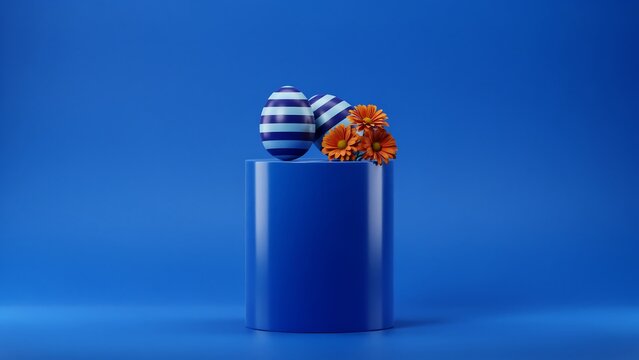 Two striped easter eggs with orange flowers on a cylindrical blue pedestal against a solid blue background, for holiday display