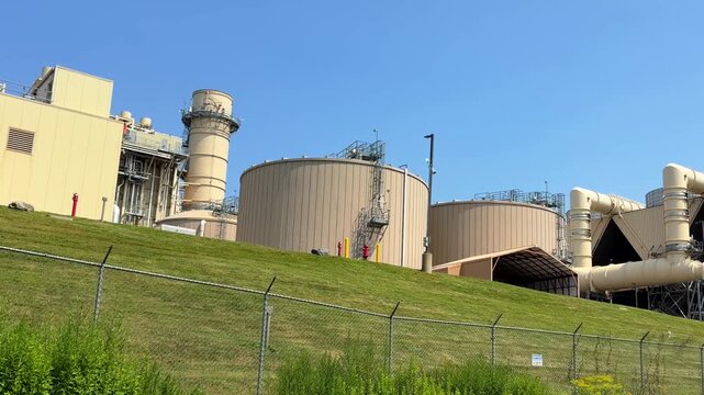 CPV Towantic Energy Center Condenser System and Circular Cooling Fans in Oxford, Connecticut with air cooled condenser system, large circular structures, and massive fans - panning reveal