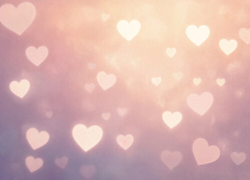 Soft pink heart bokeh creates warm romantic background, with glowing shapes scattered across peach and lavender light. Blurred hearts give this dreamy abstract pattern gentle, affectionate mood.