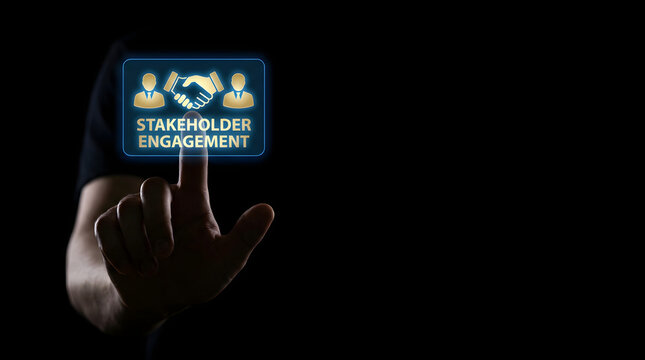 Person touching a digital interface displaying stakeholder engagement icon and text on black background
