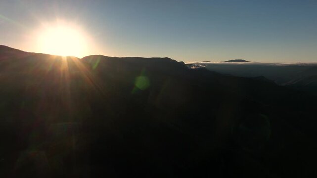 Codo de los Andes Mountain Ridges and Deep Valleys in Warm Golden Light in Bolivia. Establishing Shot. Aerial View.