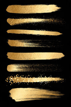 Goldene Pinselstriche mit Glitzer in verschiedenen Formen auf schwarzem Hintergrund
