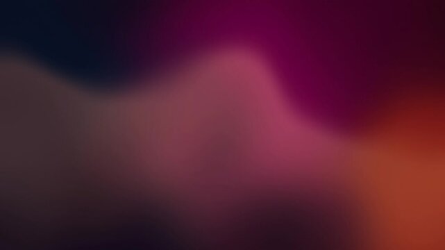 Soft blurred magenta and orange gradient waves on dark navy