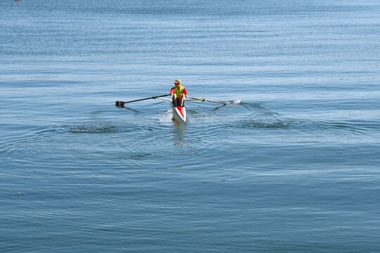Single sculler - Rower - training. Minimallism