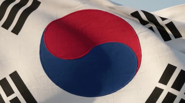 South Korea National Flag Taegukgi Waving in Blue Sky 4K