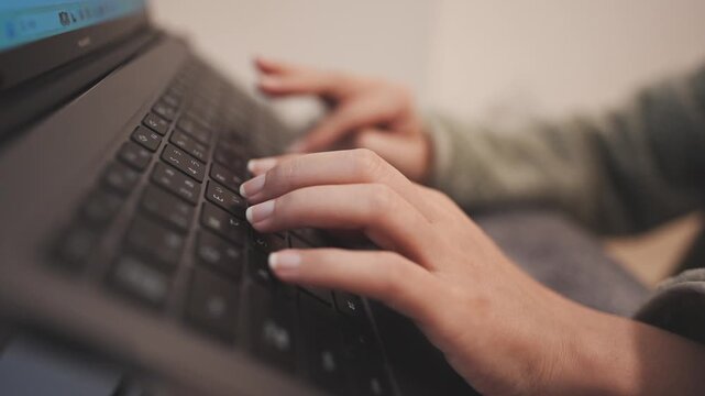 Typing on a Laptop Computer at Home or Office