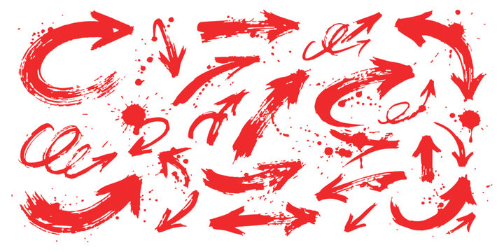 Set of hand drawn red brush stroke arrows with ink splatters and messy artistic textures for design elements