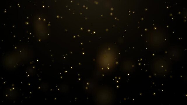 Cinematic golden particles floating in dark space with soft amber