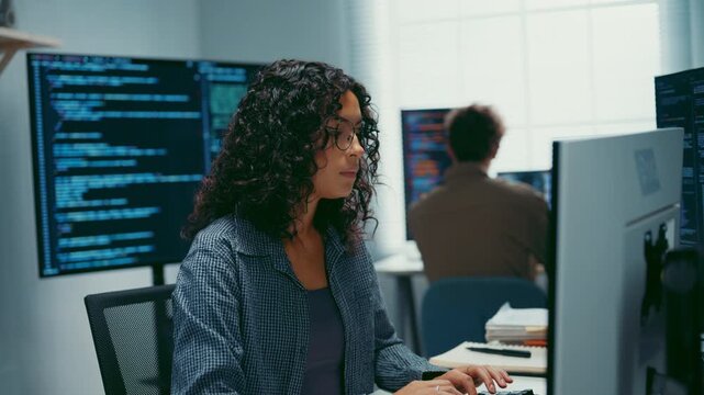 Group Adult male, female freelance typing write prompt AI bot IT app smart program nomad, video game, terminal with coding language, user interface, designer, big data center on desktop computer.