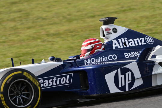 Scarperia, Italy - October 2th 2026: Williams FW25 of year 2003 ex Ralf Schumacher and Juan Pablo Montoya drive by unknown in action during practice session at Mugello Circuit.