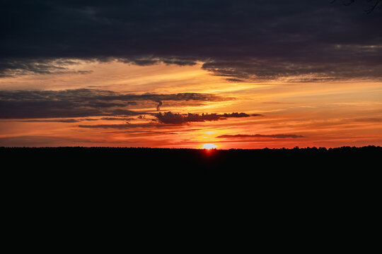 The sun is setting below the horizon.