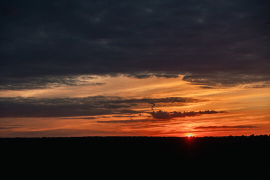 The sun is setting below the horizon.