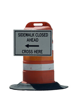 a orange traffic drum with a sign warning the side walk is closed Isolated on transparent background 