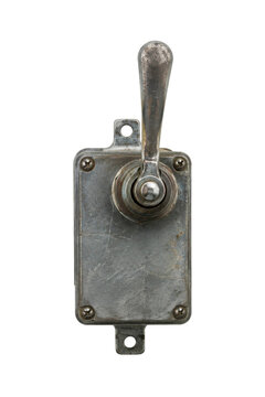 Old weathered metal lever switch with a rectangular base and visible mounting holes is captured on a clean white background