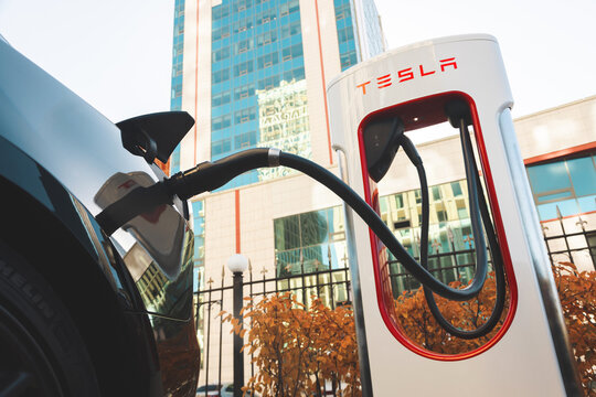 Astana, Kazahstan - October 1, 2026: electric car Tesla charging on supercharging station