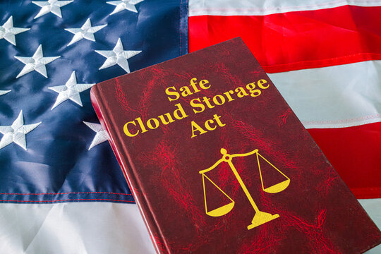 Safe Cloud Storage Act red law book on USA flag background, digital data protection legislation concept