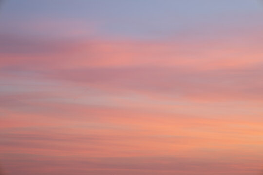 pastel sunset sky with pink and orange clouds