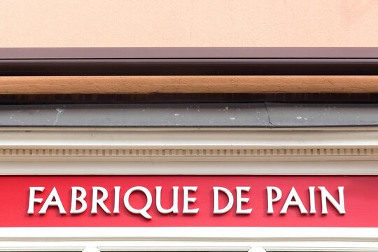 Bread making sign on a wall in France