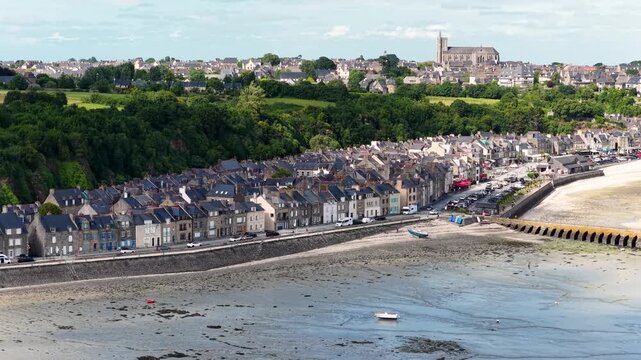 Cancale, located in the Ille-et-Vilaine department of the Brittany region in France, is a coastal town known for its oyster farms, scenic bay views and maritime heritage.