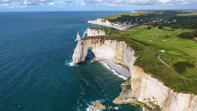 &Eacute;tretat in the Seine‑Maritime department of the Normandy region in France, is a dramatic coastal village known for its chalk cliffs, natural arches and sweeping views over the English Channel.