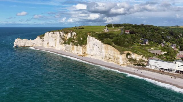 &Eacute;tretat in the Seine‑Maritime department of the Normandy region in France, is a dramatic coastal village known for its chalk cliffs, natural arches and sweeping views over the English Channel.