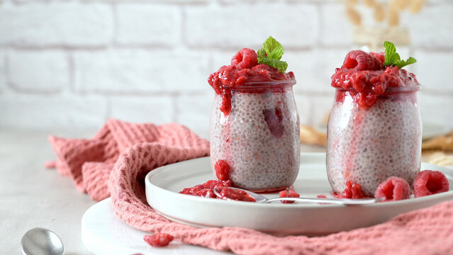 Chia seed pudding with fresh raspberries and mint