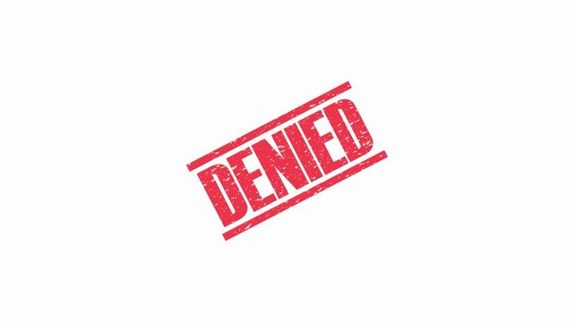 Red denied stamp with distressed texture on a white background