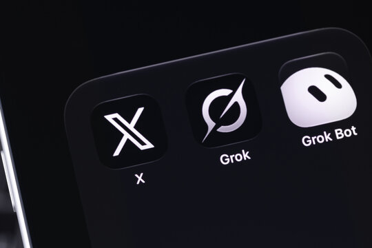 X, Grok, Grok Bot mobile icon app on a screen smartphone. Grok is a generative AI-powered chatbot developed by xAI. Batumi, Georgia - October 3, 2026