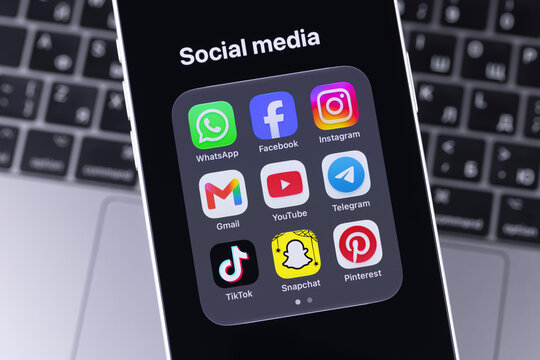 smartphone iPhone with mobile icon apps WhatsApp, Facebook, Instagram, Gmail, YouTube, Telegram, TikTok, Snapchat, Pinterest. Most popular social media platform. Batumi, Georgia - October 3, 2026