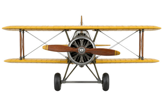 Front view of a vintage yellow biplane with a wooden propeller isolated on a white background