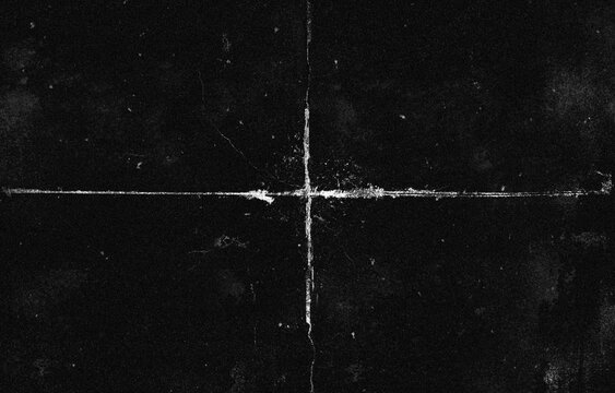Cross-shaped crack on black scratched surface. Distressed damage texture for grunge overlay, retro design and dark background.