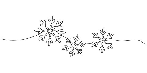 Continuous single line drawing of three snowflakes connected in a decorative winter row © Bisawjit