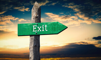 Exit - wooden signpost with one arrow, sky with sunset clouds © PX Media