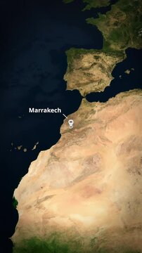 Vertical satellite map zoom to Marrakech, Morocco with a location pin marker and text. Perfect for short-form social media travel promos, mobile app backgrounds, and digital advertising campaigns.

