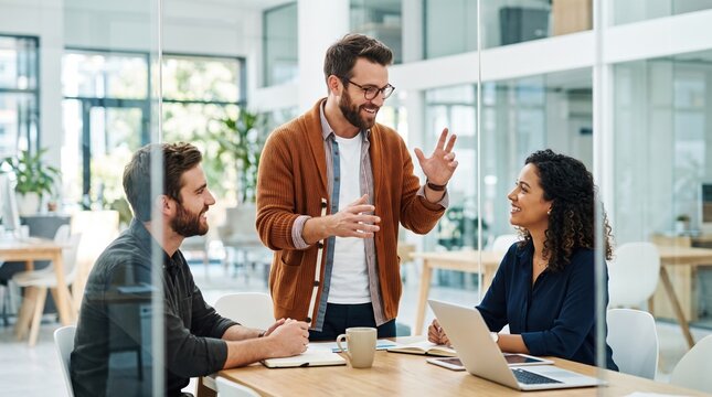 Confident male leader explain strategy during team meeting