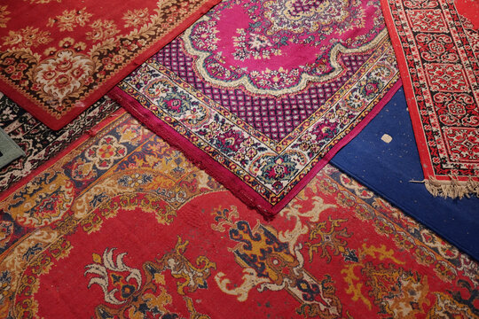 Overlapping Patterned Rugs and Carpets