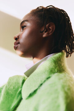 Fashion Portrait of Confident Woman in Sunlight