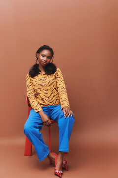 Full Body Autumn Fashion Portrait Black Woman Studio Background